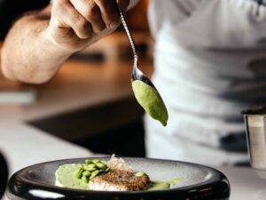 front-view-cook-preparing-food-inside-kitchen-food-meal-fry-cook (1).jpg